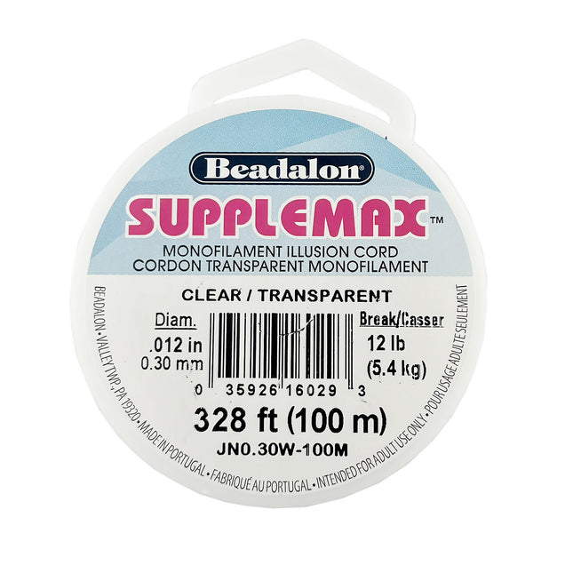 A spool of Beadalon SuppleMax clear monofilament cord, 328 feet (100m) in length, with a diameter of .012 inches (0.