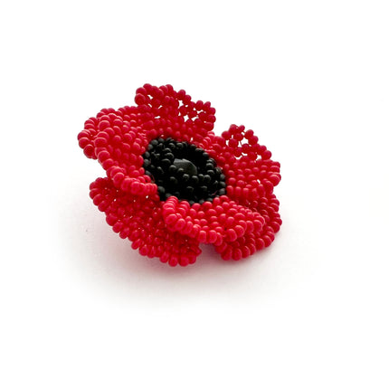 example of the red beaded poppy from the red bead poppy beading kit 