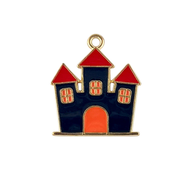 Enamelld haunted house charm stereotypically showing three towers with blood red roof top and orange windows and door