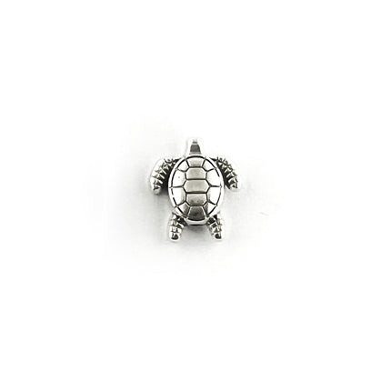 A small silver sea turtle bead