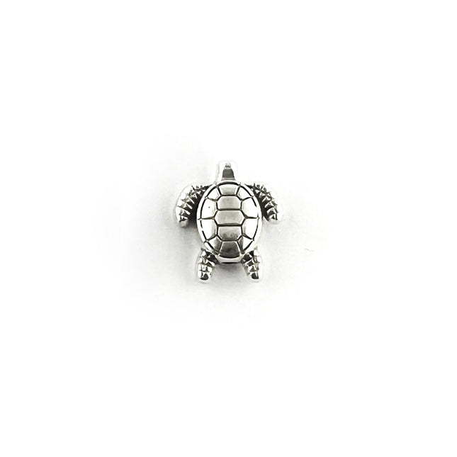 A small silver sea turtle bead