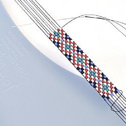 Beading on a loom