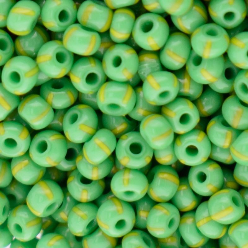 size 11 yellow striped green seed beads close up