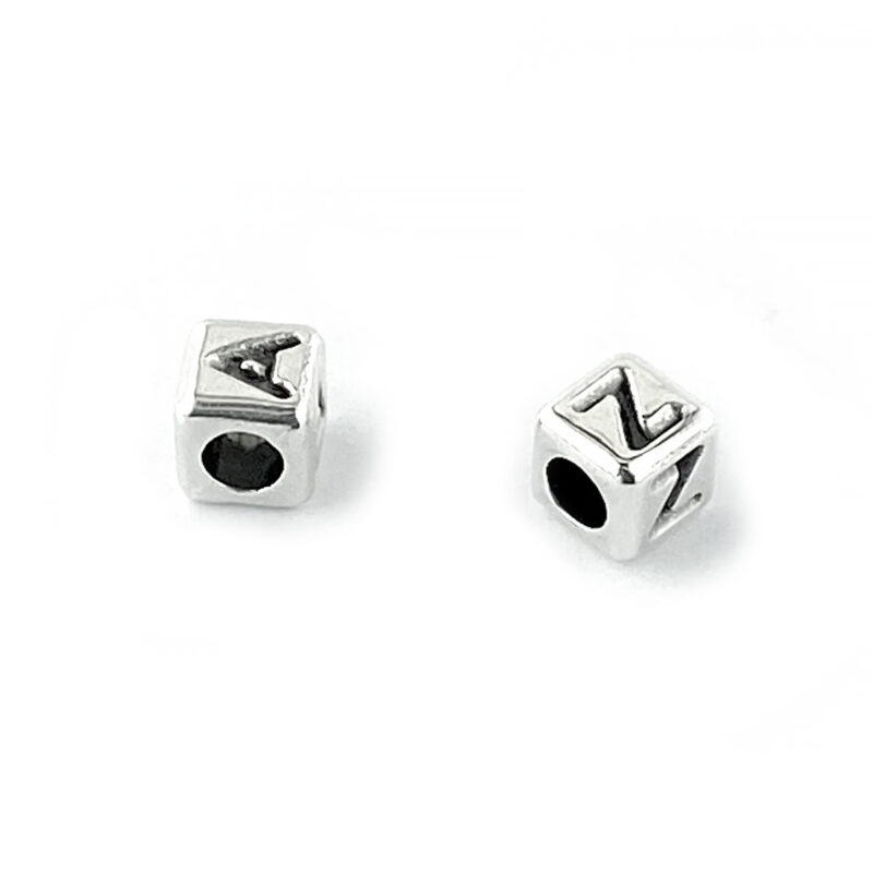 4mm cube letters showing top and sides including 2.1mm sideways hole.